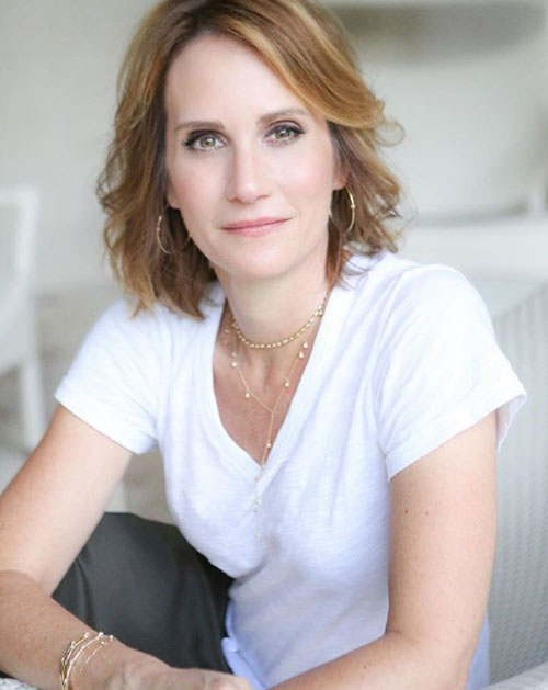 Emily Robison taking a photo.